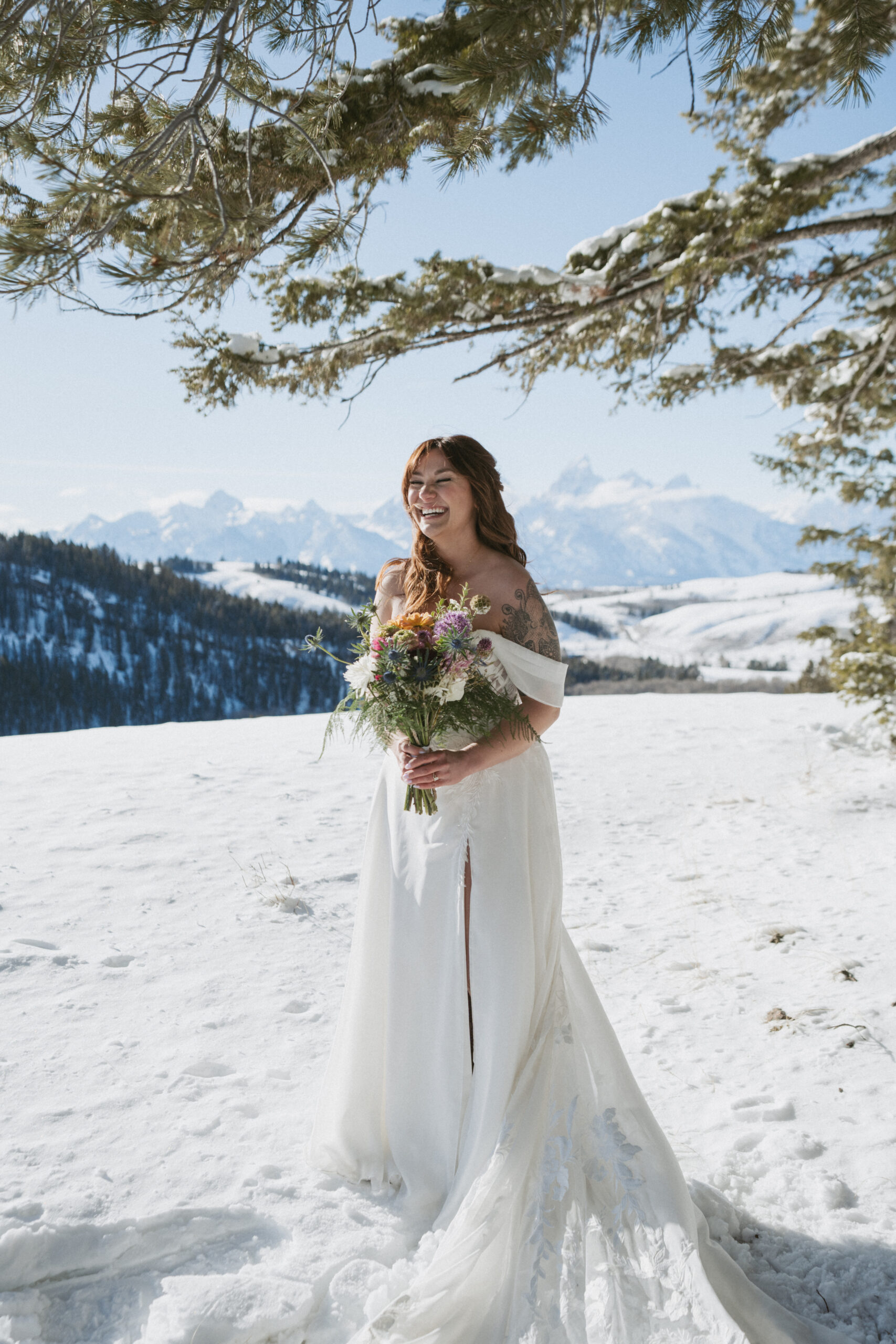 Bride posing for wedding portraits in the Grand Teton National Park. 